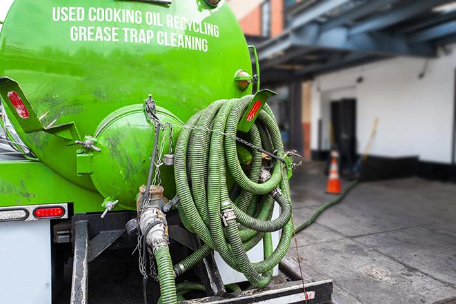 a large grease trap being pumped by a specialist in Anderson Island WA